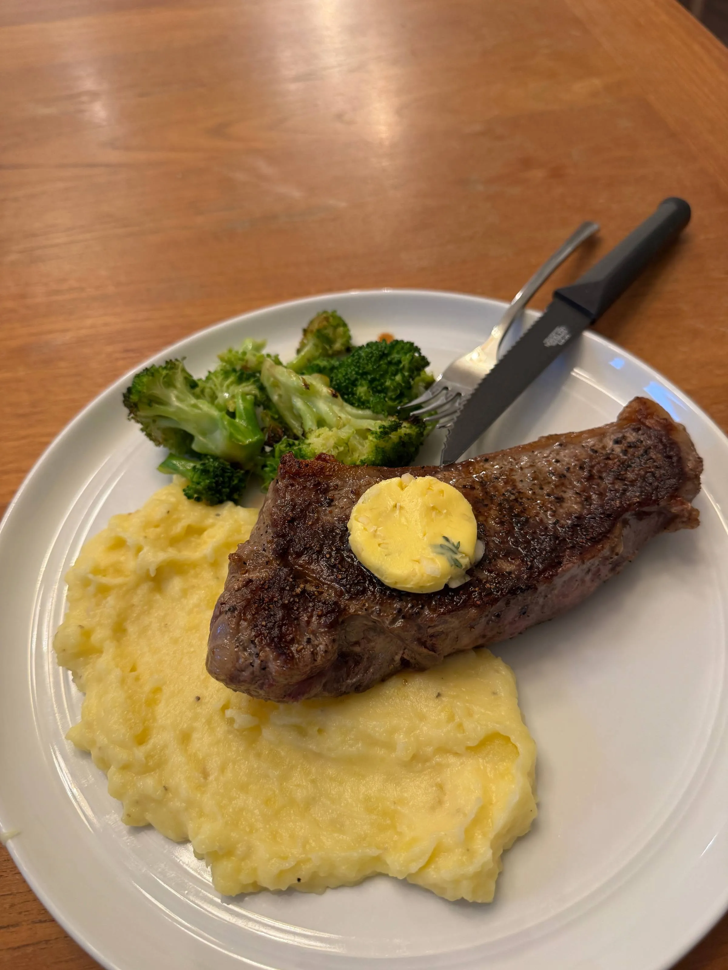 Grilled steak resting on a plate