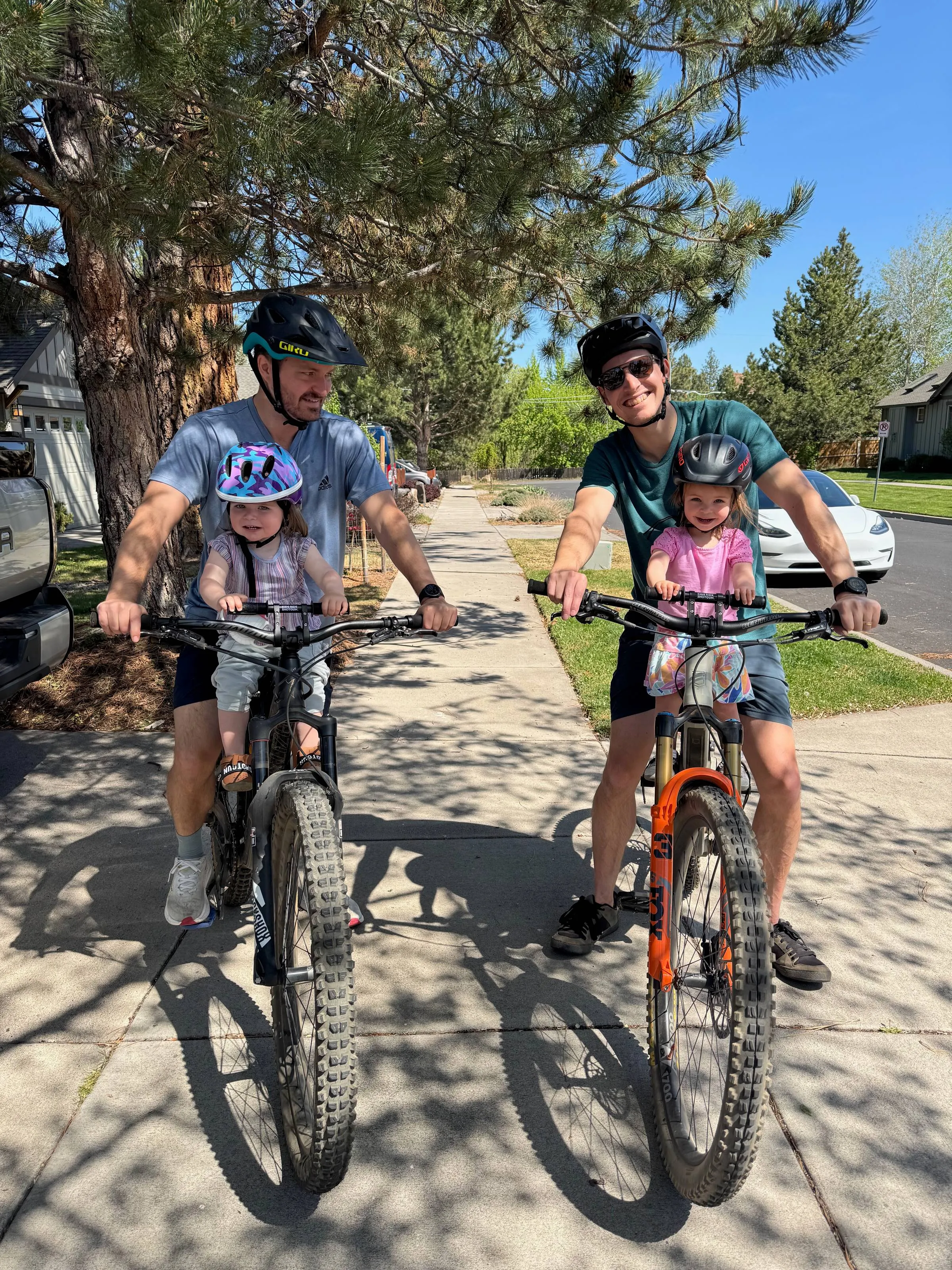 Ben’s daughters riding a two-wheeled bike