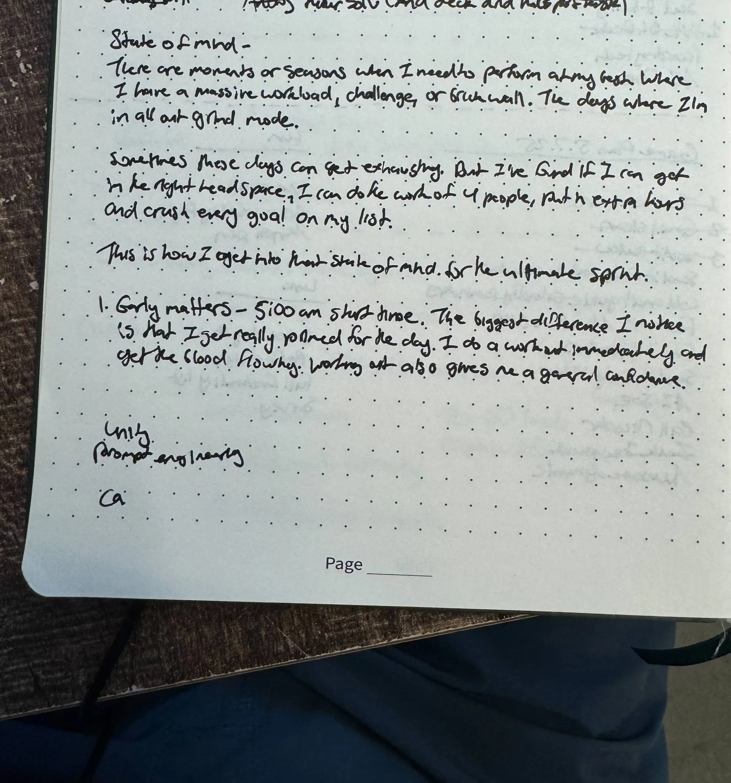 Handwritten journal page on dotted paper with notes about getting into the right state of mind and grind mode