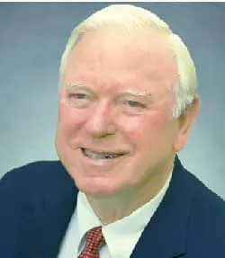 Black-and-white portrait of Cal-Maine founder Fred Adams
