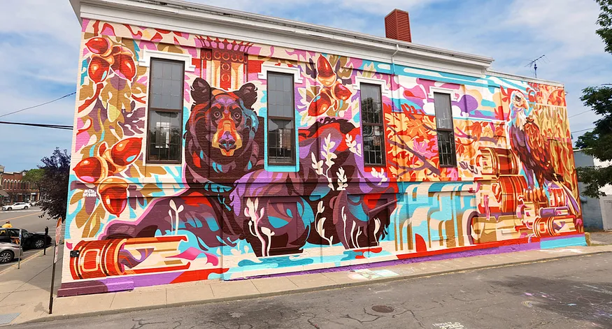 Close-up detail of the bear’s head from the Wisdom mural