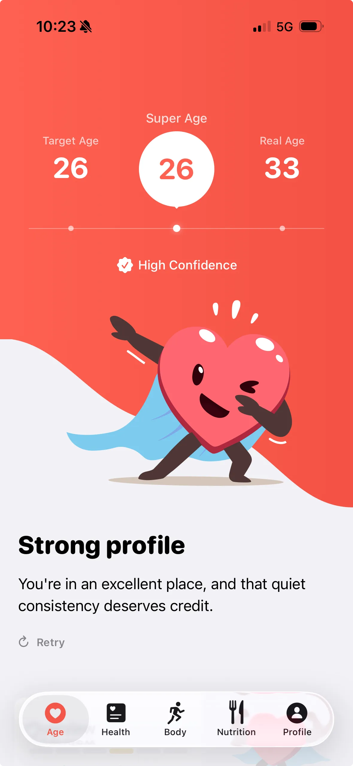 Super Age app screenshot showing a Super Age of 26 next to a real age of 33, with a “Strong profile” rating