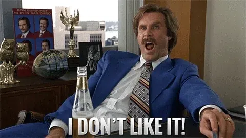 Animated meme of Will Ferrell as Ron Burgundy in a blue suit exclaiming “I DON’T LIKE IT!”