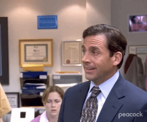 Reaction GIF of Michael Scott from The Office looking unimpressed