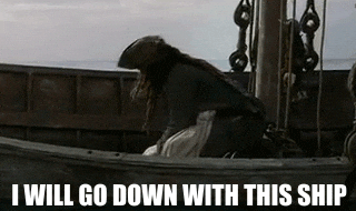 Movie still of a pirate crouched on a small boat at sea with the bold caption “I WILL GO DOWN WITH THIS SHIP”